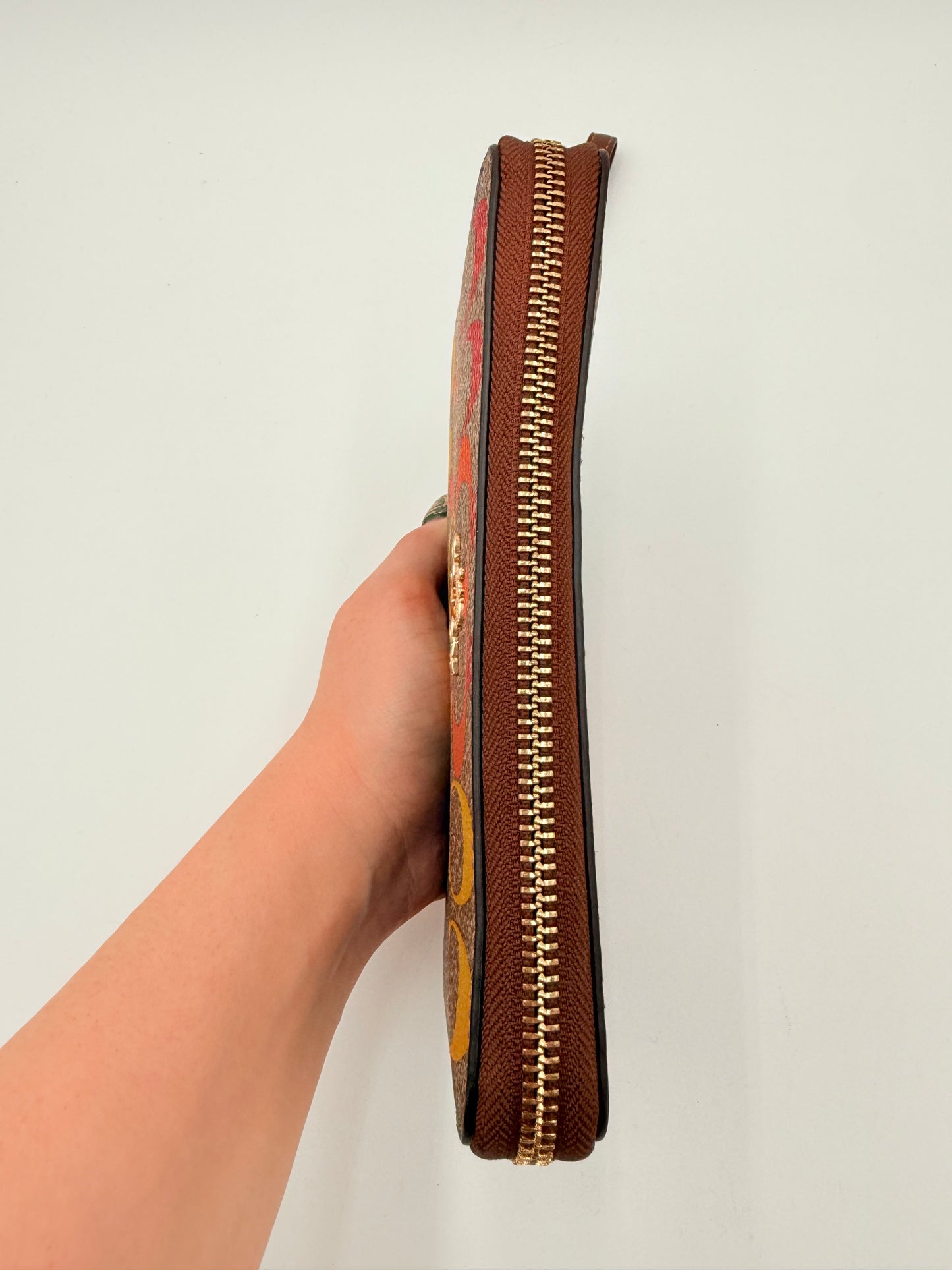 Wristlet Designer By Coach, Size: Medium
