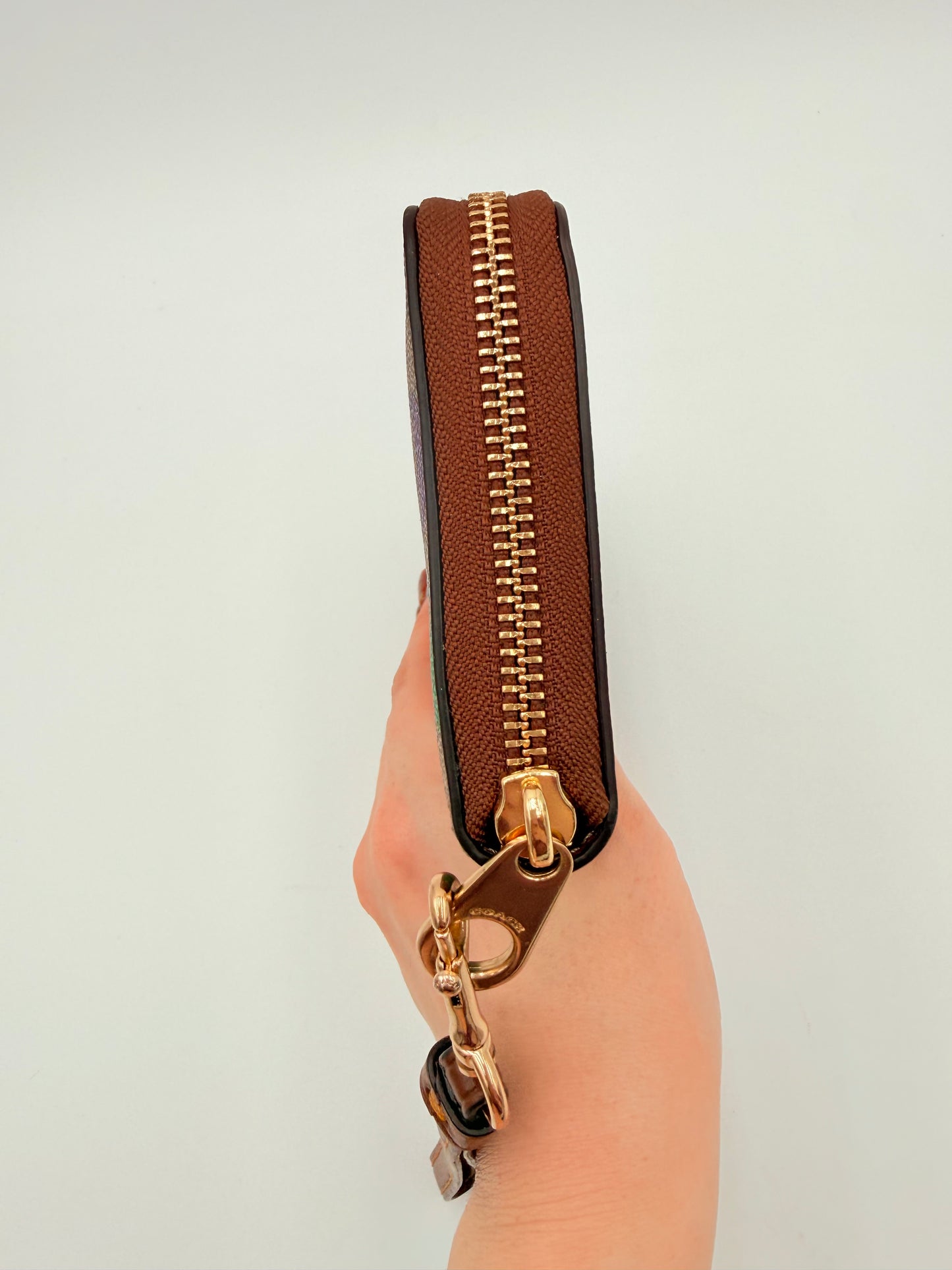 Wristlet Designer By Coach, Size: Medium